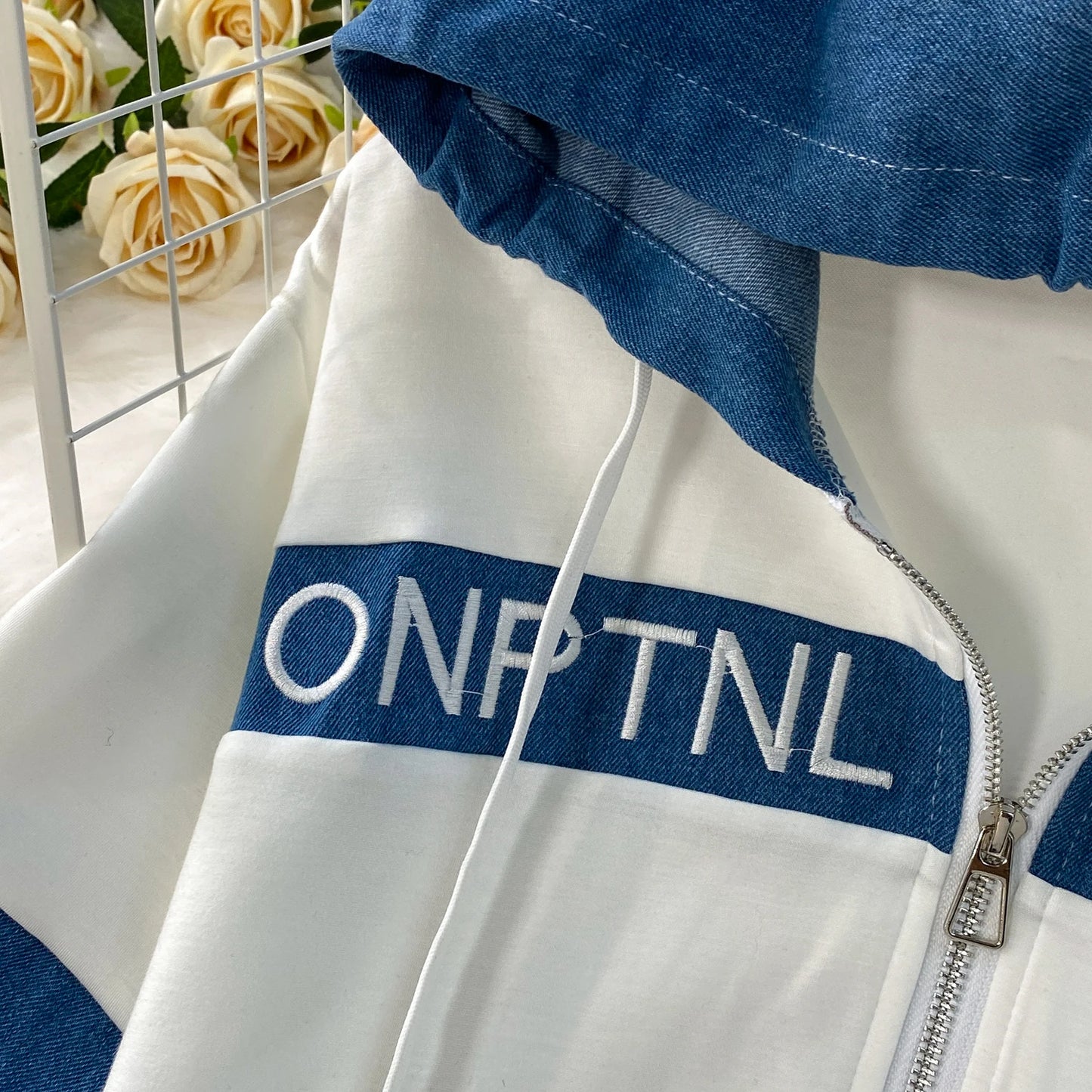 Veste à capuche costume de sport à la mode femmes été 2025 nouveau ensemble deux pièces populaire pantalon réducteur d'âge