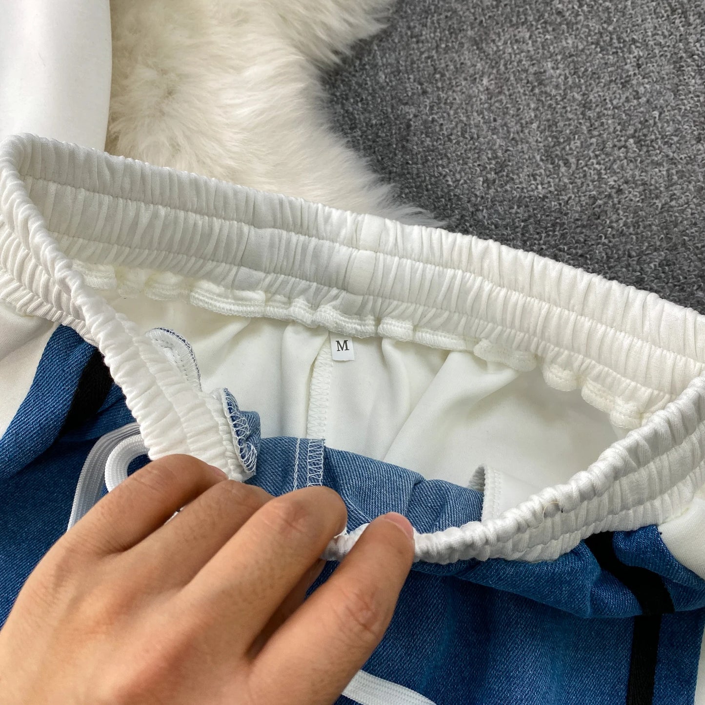 Veste à capuche costume de sport à la mode femmes été 2025 nouveau ensemble deux pièces populaire pantalon réducteur d'âge