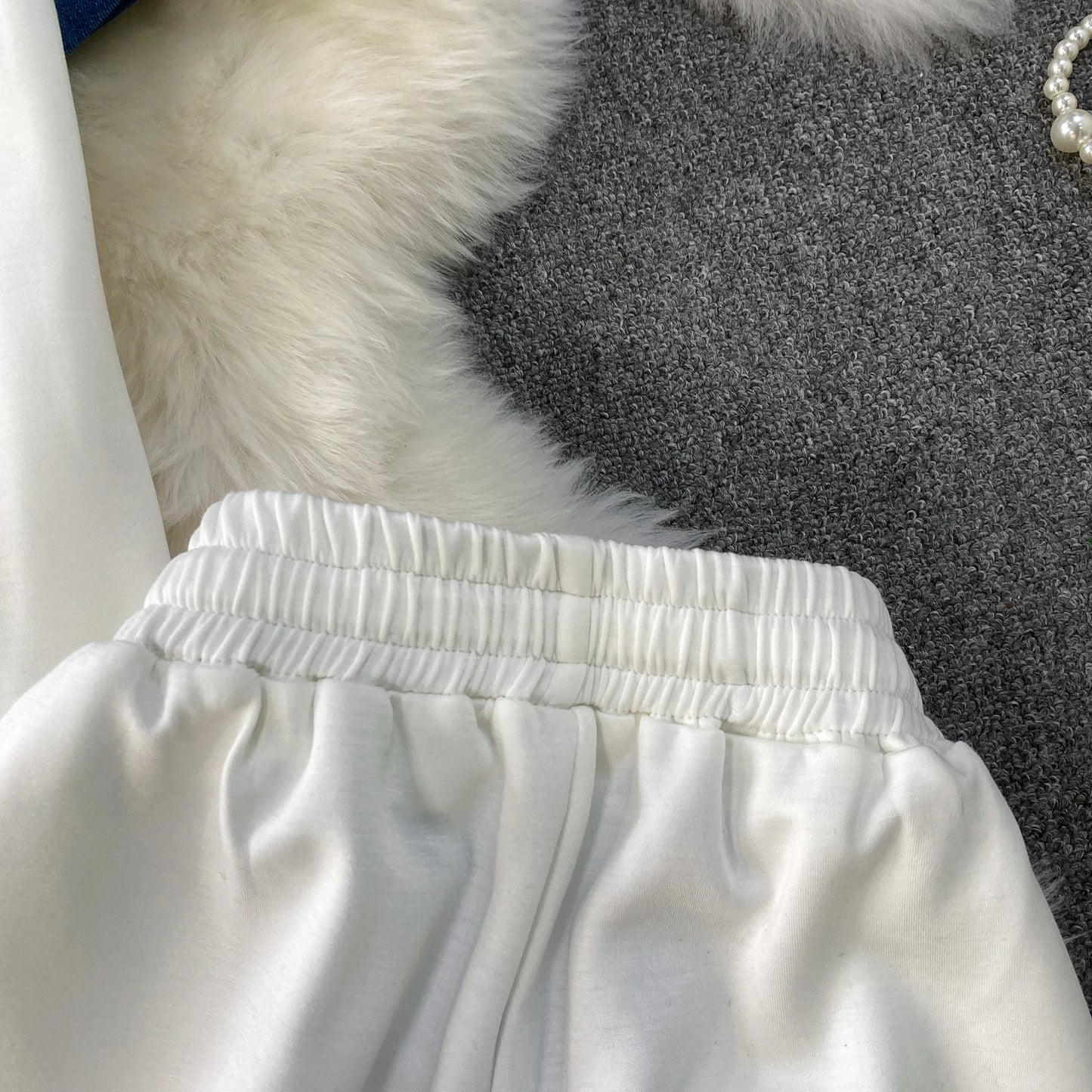 Veste à capuche costume de sport à la mode femmes été 2025 nouveau ensemble deux pièces populaire pantalon réducteur d'âge