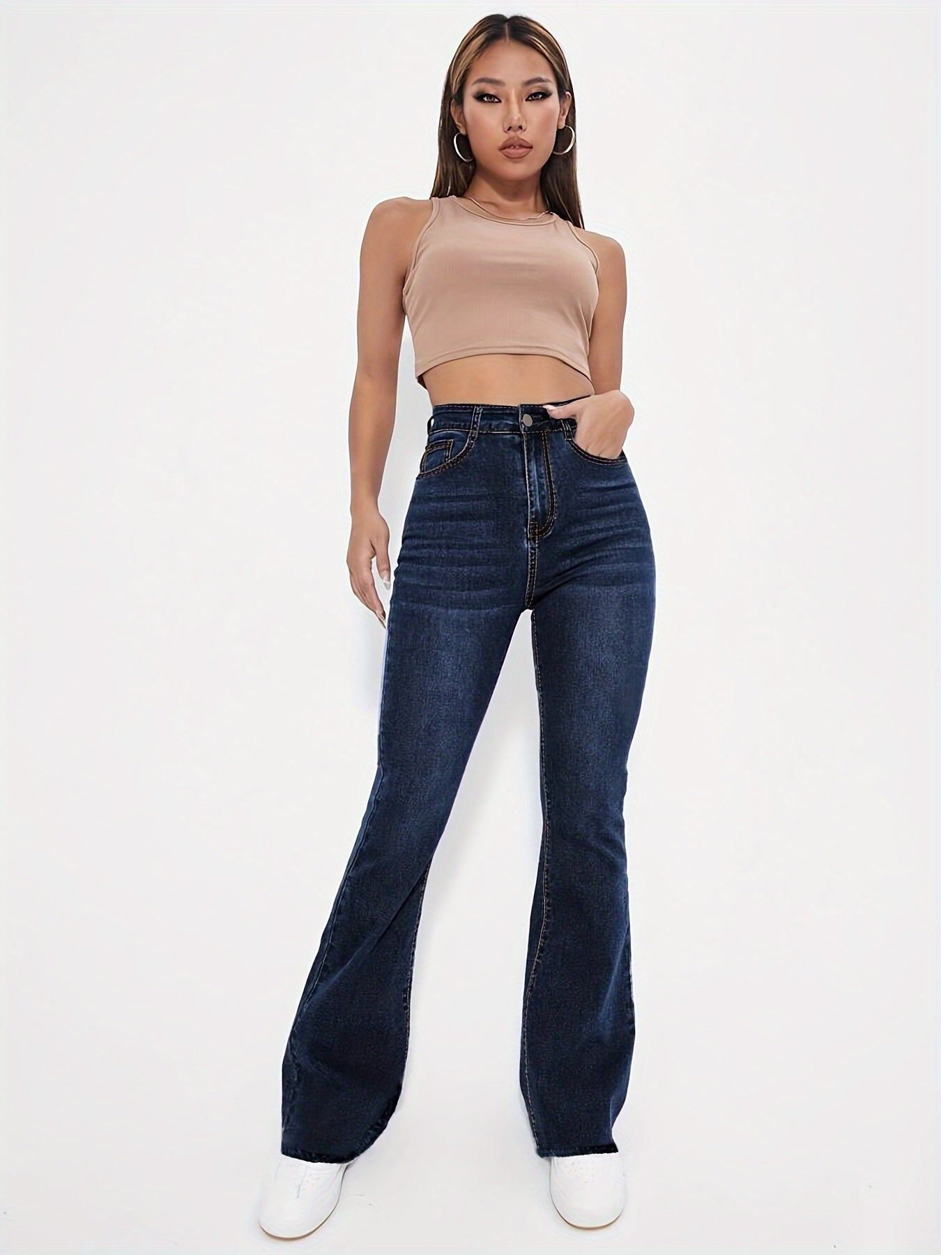 High-Rise Blue Raw Hem Flare Jeans - Slim Fit Bell Bottoms for Women - High-Stretch Denim Clothing with Trendy Style
