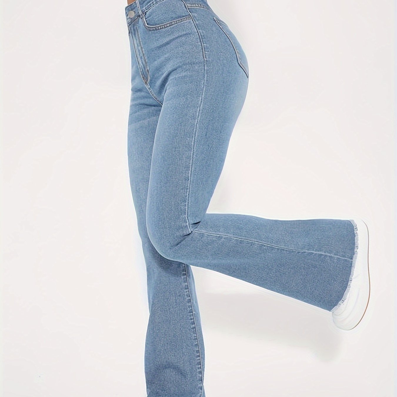 High-Rise Blue Raw Hem Flare Jeans - Slim Fit Bell Bottoms for Women - High-Stretch Denim Clothing with Trendy Style