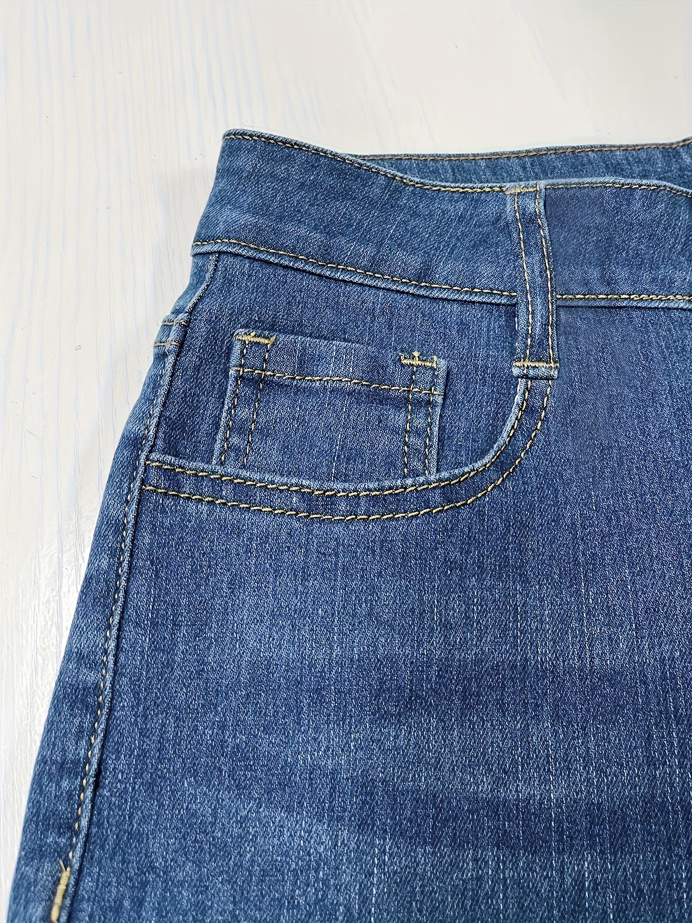 High-Rise Blue Raw Hem Flare Jeans - Slim Fit Bell Bottoms for Women - High-Stretch Denim Clothing with Trendy Style