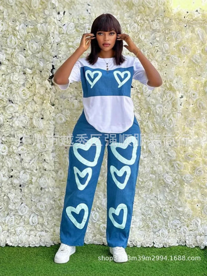 Personnalisé 2025 nouvelles femmes rayure imprimé 2 pièces ensembles survêtement femmes décontracté grande taille bureau montre de sport et pantalon à jambes larges ensemble