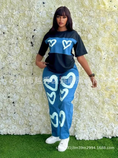 Personnalisé 2025 nouvelles femmes rayure imprimé 2 pièces ensembles survêtement femmes décontracté grande taille bureau montre de sport et pantalon à jambes larges ensemble