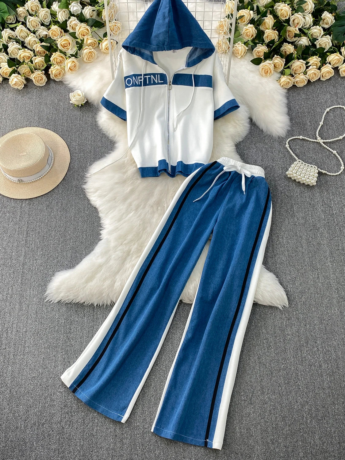 Veste à capuche costume de sport à la mode femmes été 2025 nouveau ensemble deux pièces populaire pantalon réducteur d'âge