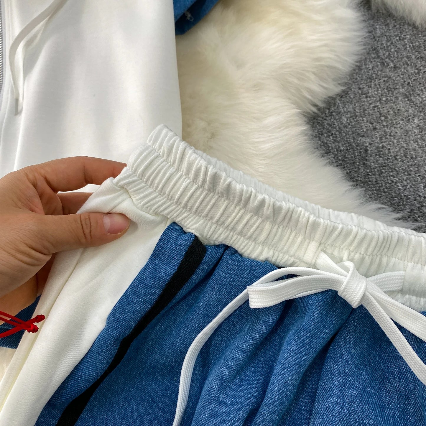 Veste à capuche costume de sport à la mode femmes été 2025 nouveau ensemble deux pièces populaire pantalon réducteur d'âge