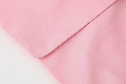 Le nouveau costume de sport pour femmes 2025 présente un cravate réversible à la mode et de grand style décontracté avec deux poches