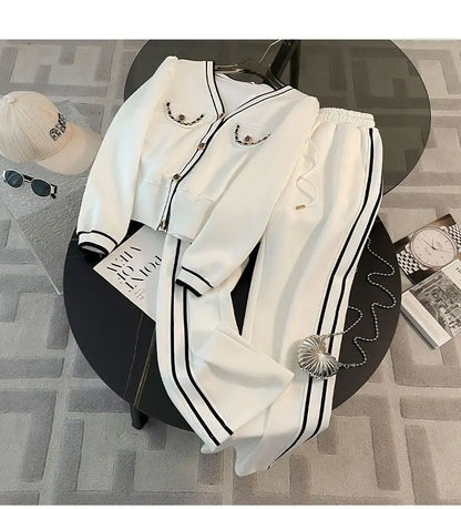 Printemps et automne haut de gamme sport décontracté ensemble femmes Western col en v haut pantalon à jambes larges deux pièces Setj Uicy Corture survêtement