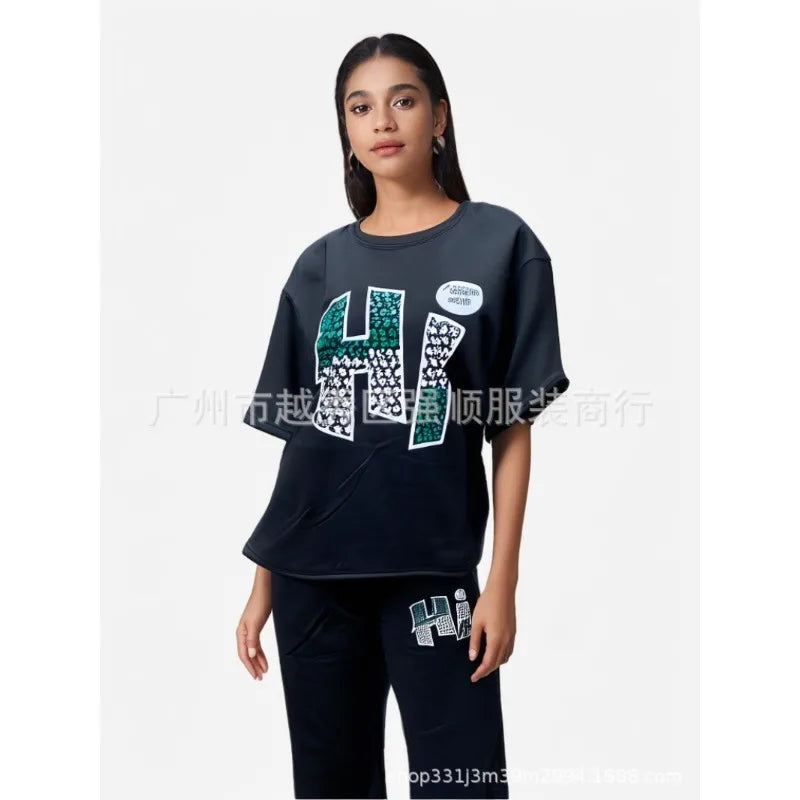 Personnalisé 2025 nouvelles femmes rayure imprimé 2 pièces ensembles survêtement femmes décontracté grande taille bureau montre de sport et pantalon à jambes larges ensemble