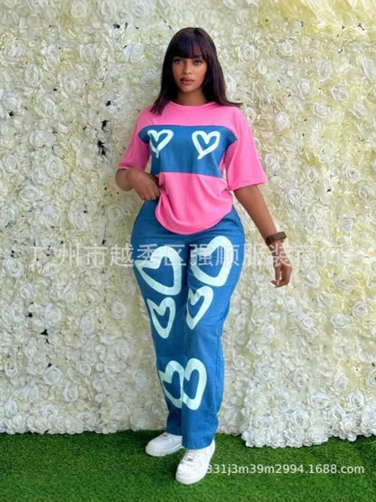 Personnalisé 2025 nouvelles femmes rayure imprimé 2 pièces ensembles survêtement femmes décontracté grande taille bureau montre de sport et pantalon à jambes larges ensemble