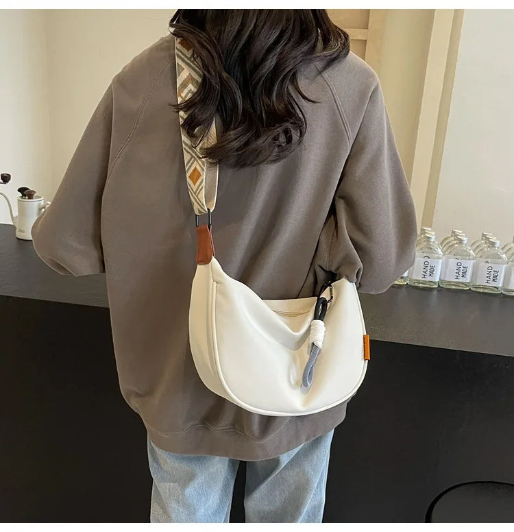 2024 nouvelle mode sac à bandoulière Simple large bandoulière conception unique sac à bandoulière Style Original trajet boulette femmes sac