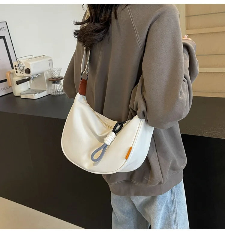 2024 nouvelle mode sac à bandoulière Simple large bandoulière conception unique sac à bandoulière Style Original trajet boulette femmes sac