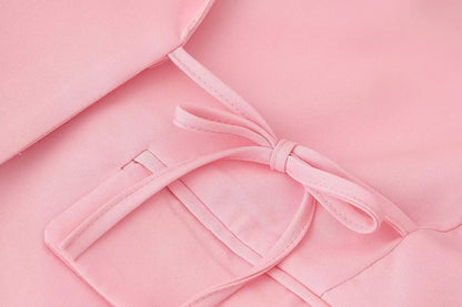 Le nouveau costume de sport pour femmes 2025 présente un cravate réversible à la mode et de grand style décontracté avec deux poches