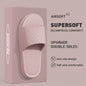 Jolies pantoufles d'été de couleur unie pour femmes et hommes, diapositives de salle de bain EVA antidérapantes, sandales légères concises, chaussures de couple