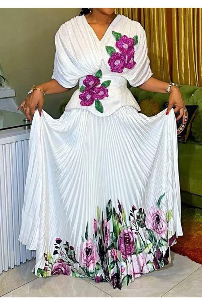 Printemps et été 2025 nouvelle robe plissée vintage à fleurs brodées à la taille, col en v, manches chauve-souris, taille haute, robe élégante.