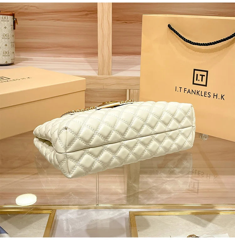 Sac à chaîne en cuir véritable pour femmes en 2025, nouveau design avec un sens du luxe, sac à bandoulière sous les bras de grande capacité