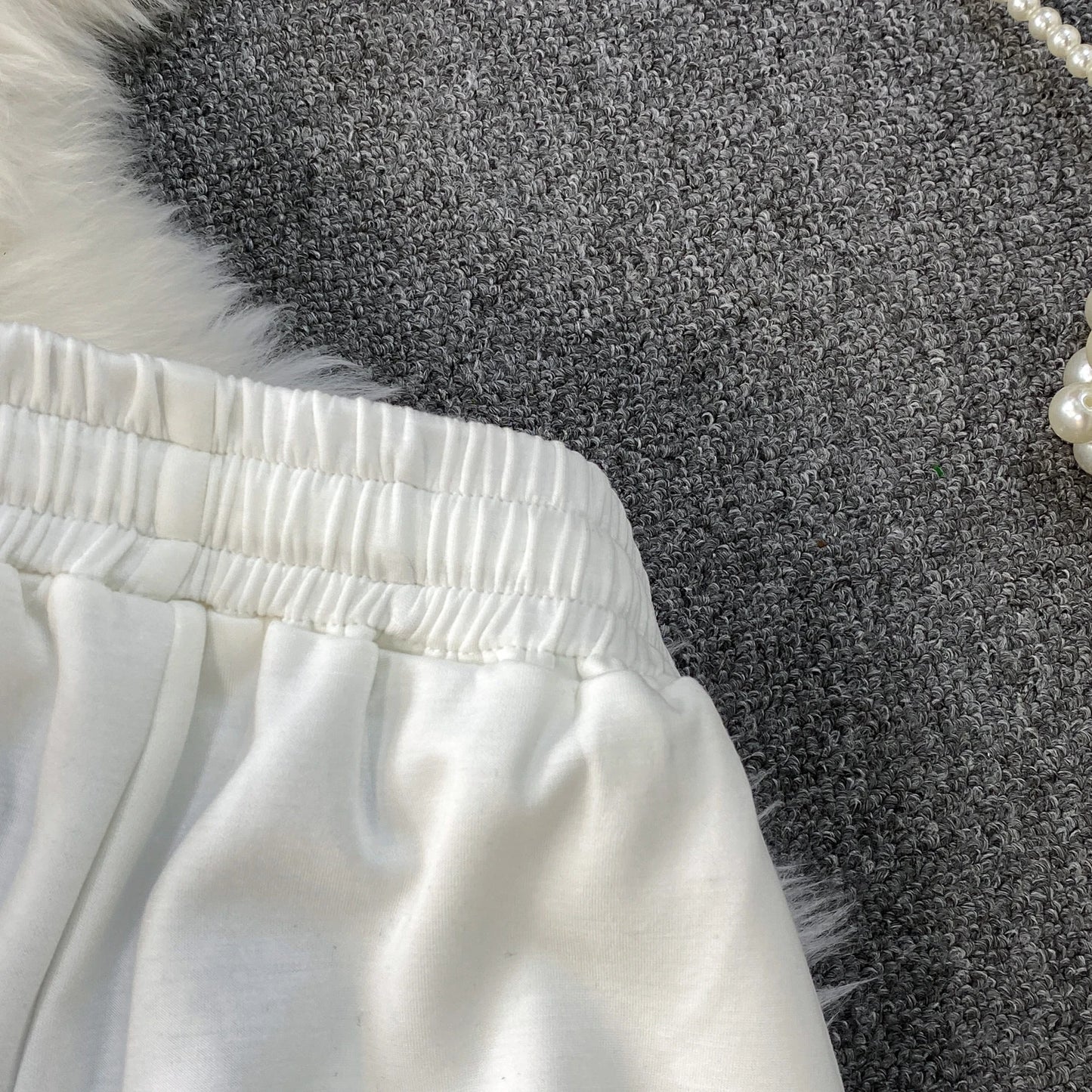 Veste à capuche costume de sport à la mode femmes été 2025 nouveau ensemble deux pièces populaire pantalon réducteur d'âge