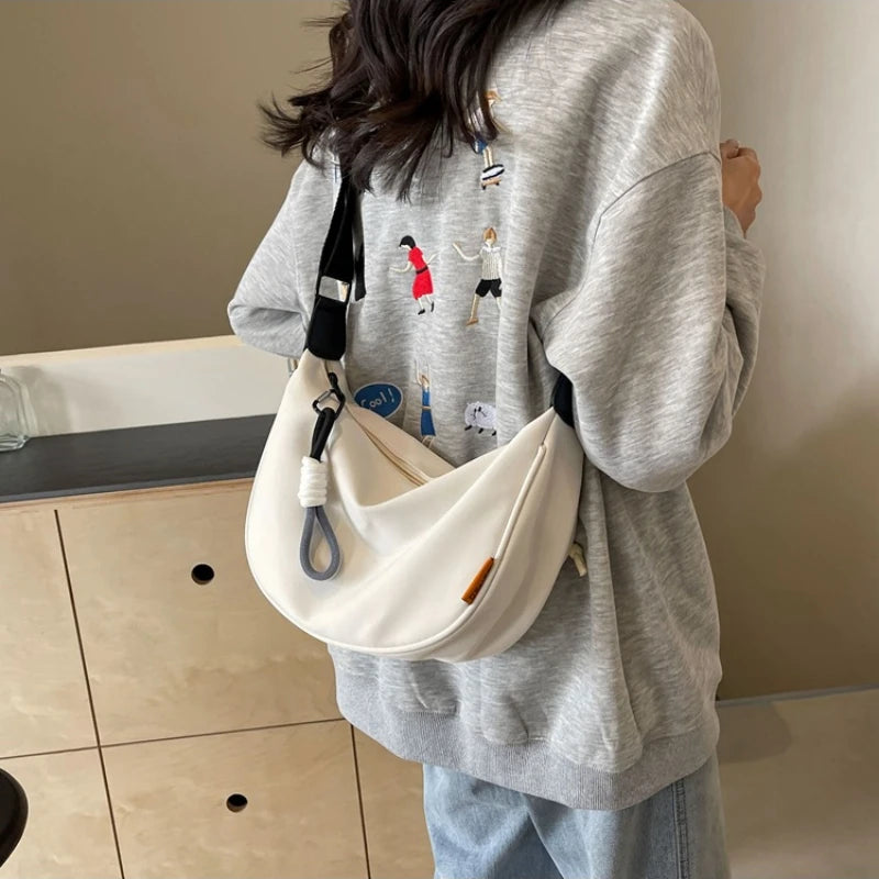 2024 nouvelle mode sac à bandoulière Simple large bandoulière conception unique sac à bandoulière Style Original trajet boulette femmes sac