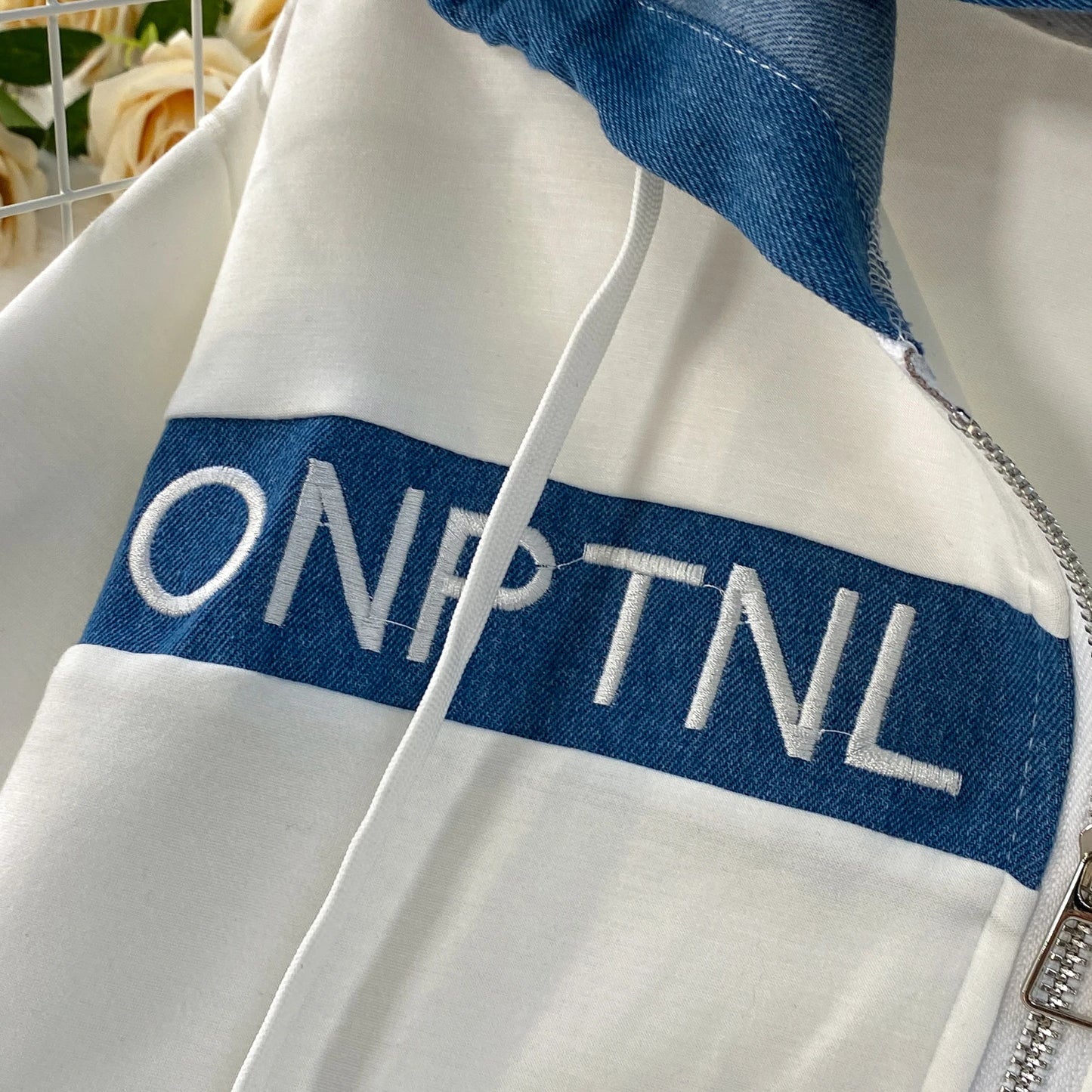 Veste à capuche costume de sport à la mode femmes été 2025 nouveau ensemble deux pièces populaire pantalon réducteur d'âge