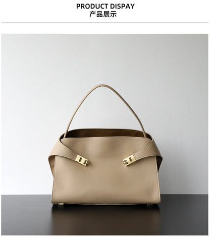 Niche léger luxe haut de gamme en cuir grande capacité première couche peau de vache sac à main pour femme sac fourre-tout banlieue loisirs polyvalent