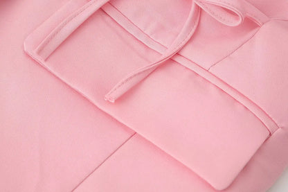 Le nouveau costume de sport pour femmes 2025 présente un cravate réversible à la mode et de grand style décontracté avec deux poches