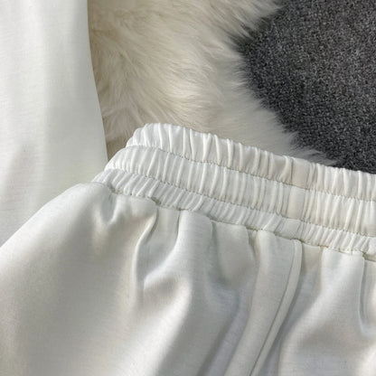 Veste à capuche costume de sport à la mode femmes été 2025 nouveau ensemble deux pièces populaire pantalon réducteur d'âge