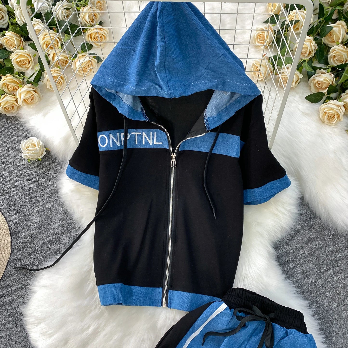 Veste à capuche costume de sport à la mode femmes été 2025 nouveau ensemble deux pièces populaire pantalon réducteur d'âge