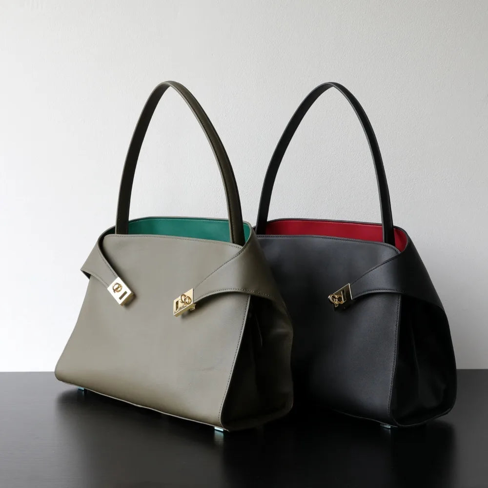 Niche léger luxe haut de gamme en cuir grande capacité première couche peau de vache sac à main pour femme sac fourre-tout banlieue loisirs polyvalent