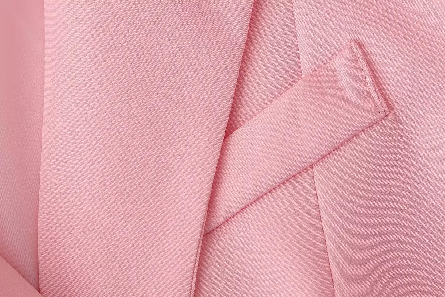 Le nouveau costume de sport pour femmes 2025 présente un cravate réversible à la mode et de grand style décontracté avec deux poches