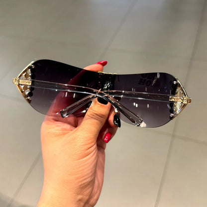 Lunettes de soleil de luxe y2k sans monture pour femmes, avec lettres en strass, de marque de styliste, pour l'extérieur, UV400