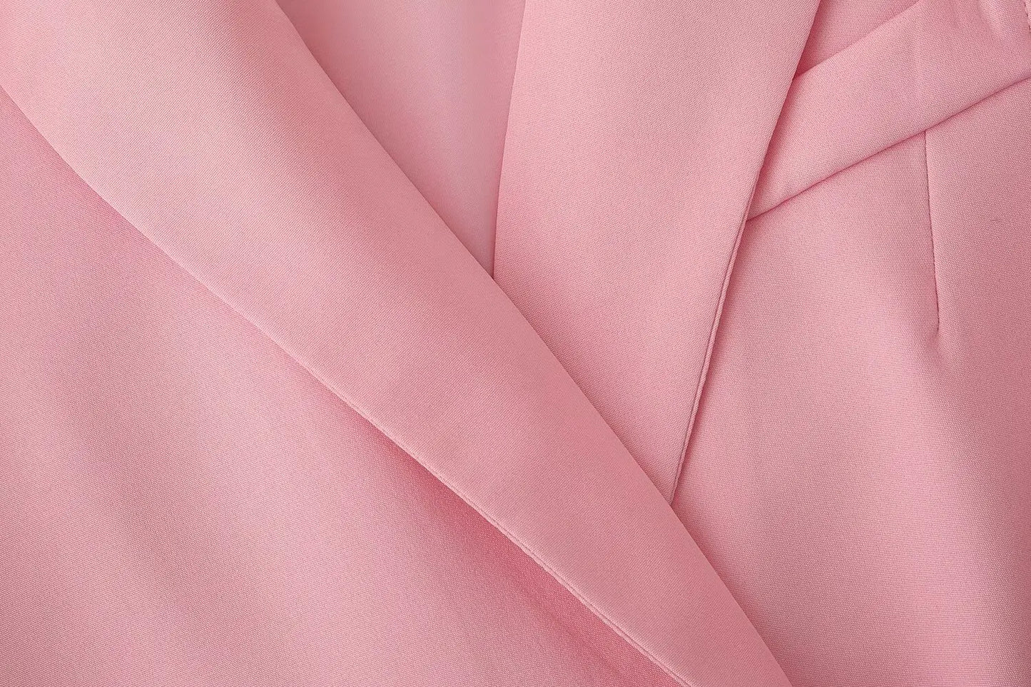 Le nouveau costume de sport pour femmes 2025 présente un cravate réversible à la mode et de grand style décontracté avec deux poches