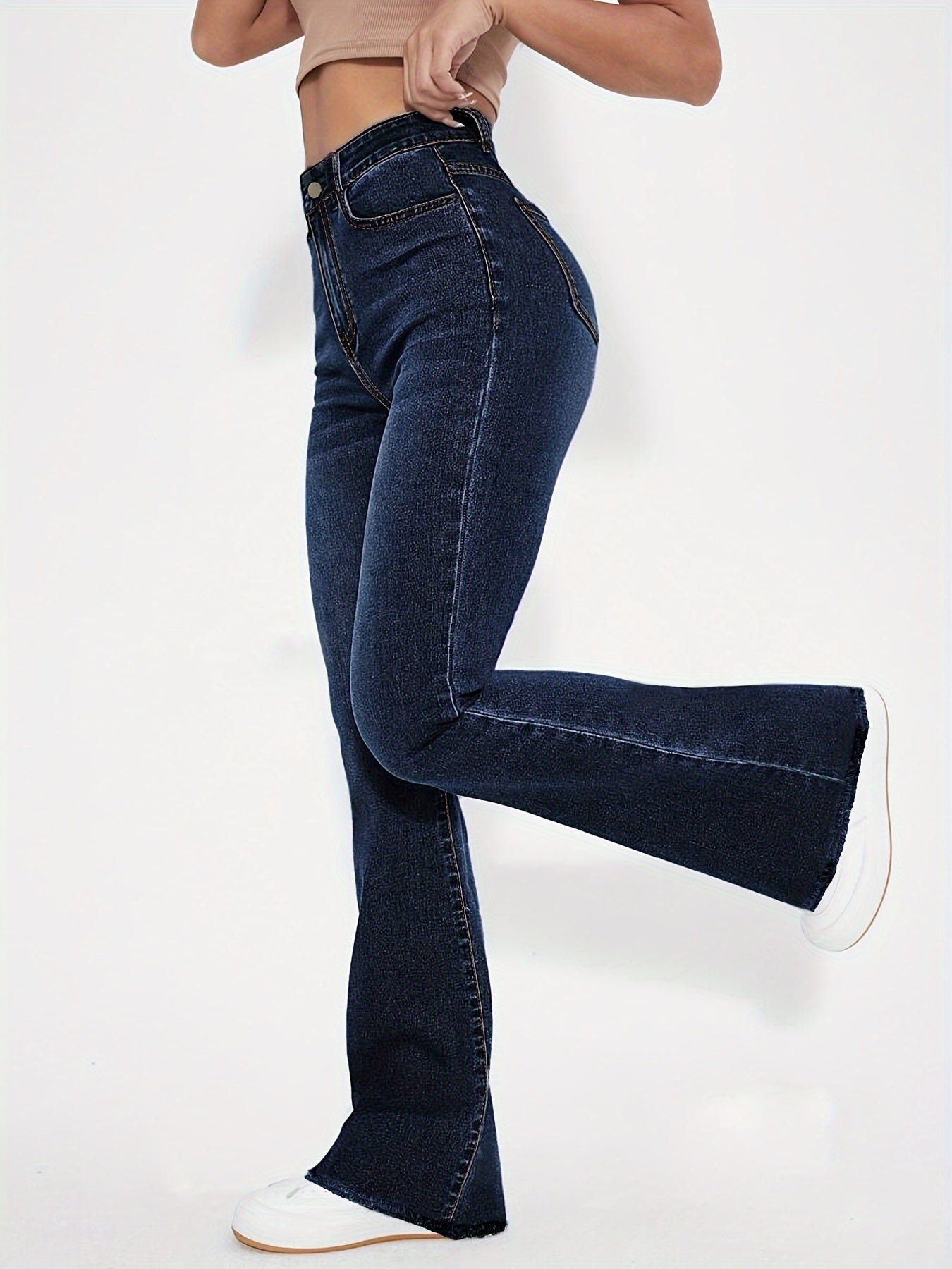 High-Rise Blue Raw Hem Flare Jeans - Slim Fit Bell Bottoms for Women - High-Stretch Denim Clothing with Trendy Style